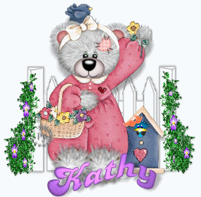 Bear with bird on her head in garden